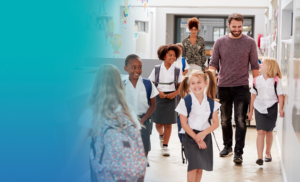 kids-in-school-hallway-smilling-with-teacher