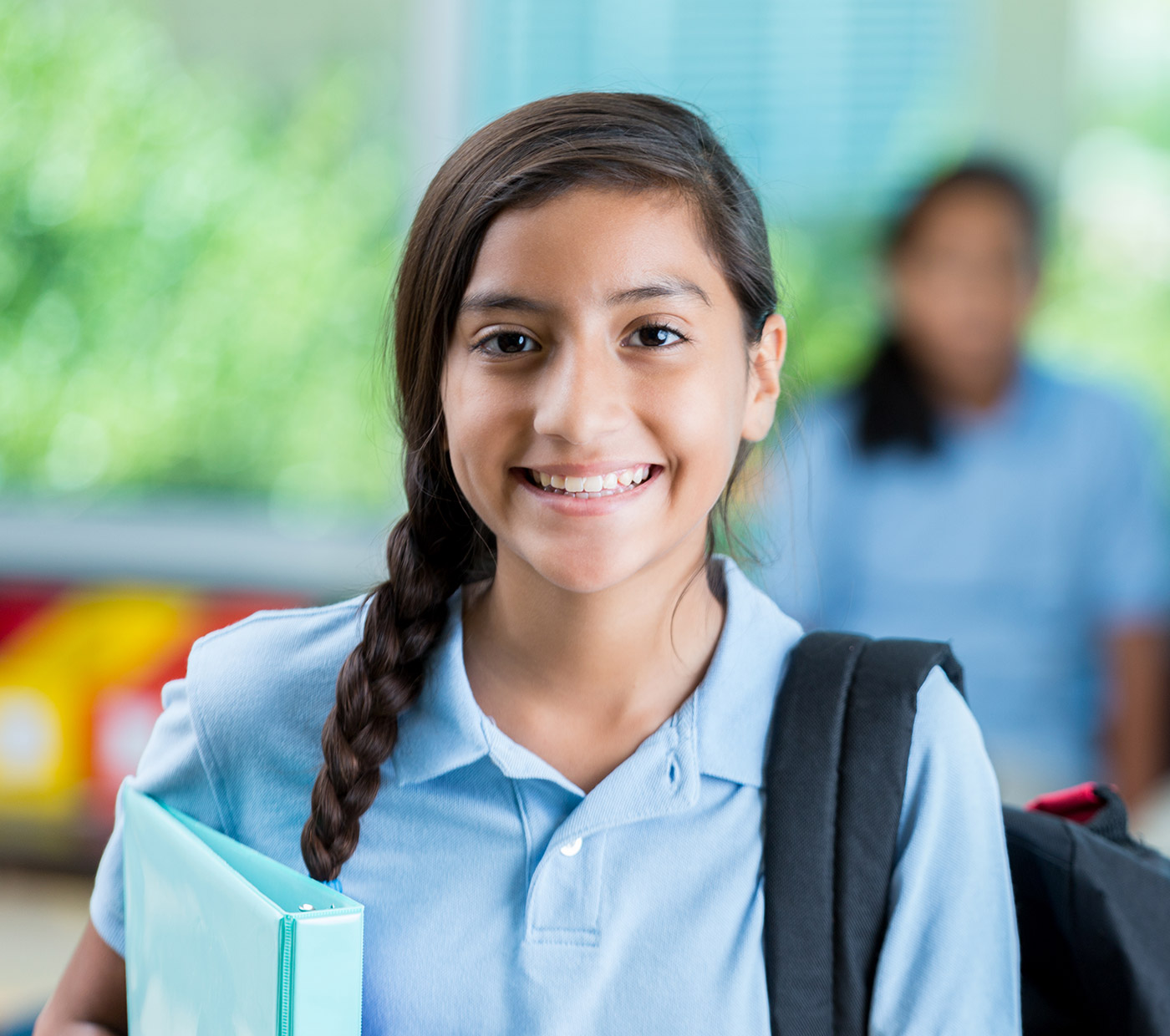 A smiling private school student