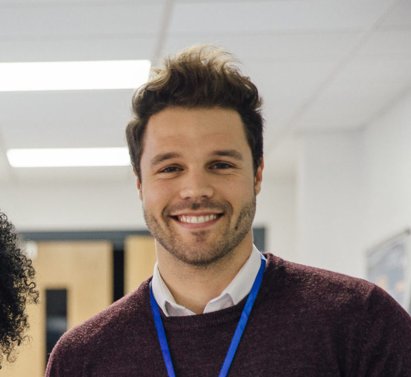 An IT Director in a private school smiling
